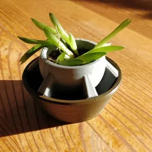 Small, simple flowerpot with drainage holes