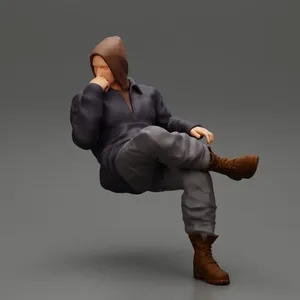 man in leather jacket and jeans sitting cross legged and thinking