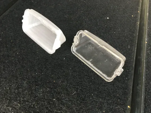 Peugeot/Citroen licenseplate bulb cover
