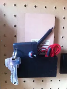 Notebook and keys pegboard container
