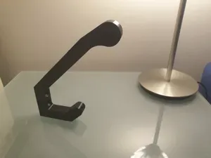 Motorcycle helmet hanger with hook for wall