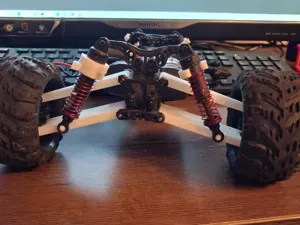 Long travel suspension arm for a chinese RC car