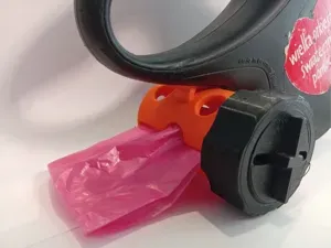 Dog waste bag dispenser WITH REWINDER! Flexi leash