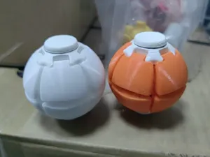 压钮球（使用柔性材料则无需橡皮筋）