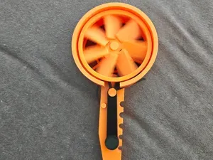 Squeeze Breeze — Trigger-Spun Fan Toy
