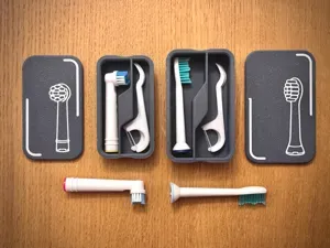 Electric toothbrush head and floss travel box