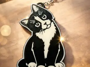 adorable black & white cat keychain