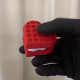 Heart Shaped Waffle Fidget Clicker — Image 3 of 4