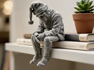 Sad Grinch Figurine sitting on a ledge!
