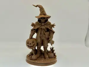 scarecrow figure with pumpkins for Halloween