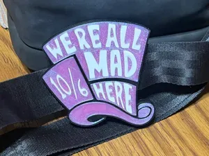 We’re All Mad Here Bag Strap Charm