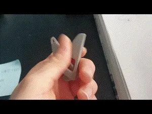Mini Phone Stand and Fidget toy, for a Keychain