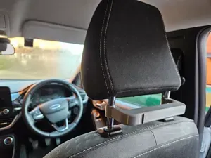 Car headrest grab handle