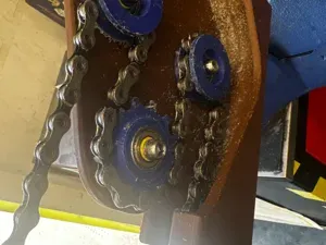 Chain waxing base plate upgrade with wax trap