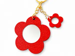 Chaveiro flor espelho com pingente
