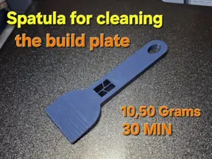 Spatula for cleaning the build plate