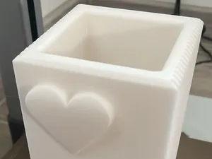 Flower vase with hearts and stripes