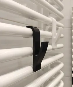 Towel hanger for bathroom radiator