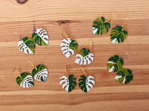 Monstera earrings with fenestrations
