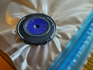 Vacuum bag seal disc