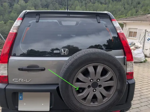 Rear view camera bracket for spare wheel