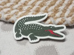 Spilla lacoste