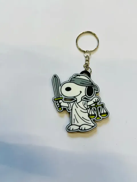 Snoopy-inspired Lady Justice keychain — Image 2 of 3