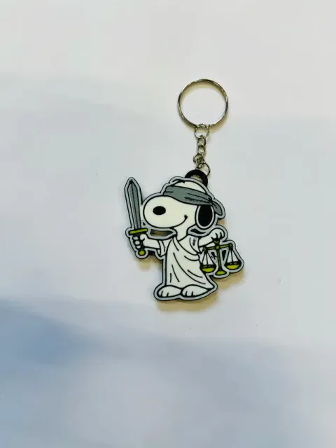 Snoopy-inspired Lady Justice keychain — Image 3 of 3