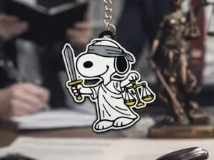 Snoopy-inspired Lady Justice keychain