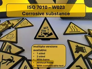 Warning - Corrosive substance - W023 ISO 7010