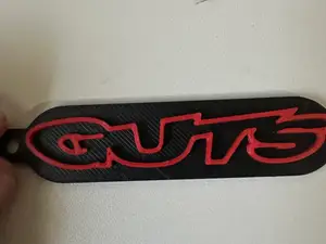 Guts racing keychain