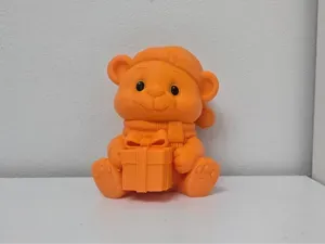 Sitting Teddy Bear with Gift Christmas Figurine