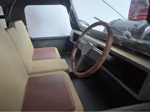 2 Door Defender with bench seat in back 