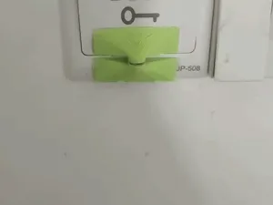 86型自复位翘板开关保持器