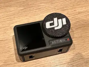 DJI Osmo Action 4 lens cap with logo