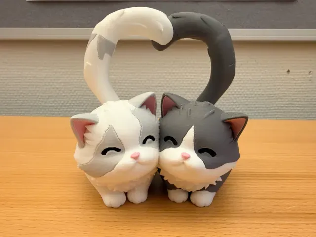 Valentine cats with heart tails