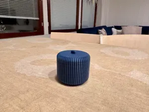 Minimalist ribbed container with a lid