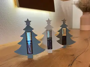 Weihnachtsbaum mit Stern für Merci Schokolade