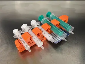 Spritzenhalter mit intigriertem Ampullenöffner