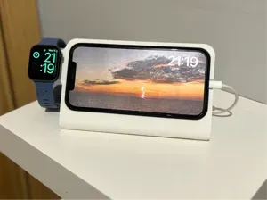 iPhone 16 Pro Max (w/case) and Apple Watch dock