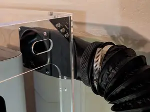 Low-profile exhaust port adaptor