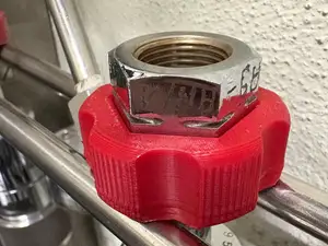 Ergonomic adapter for 27 mm hex nut