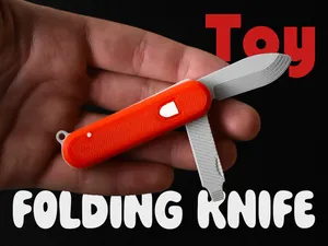 Toy folding knife. Swiss army style Fidget