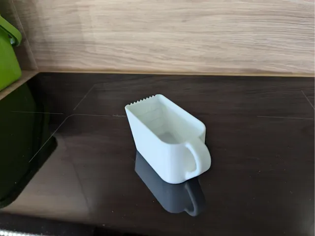 Compact Detergent Measuring Cup