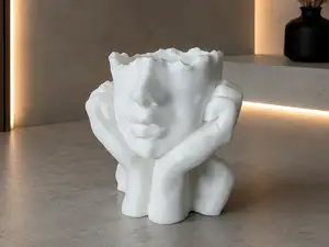 Decorative bowl in the shape of a head