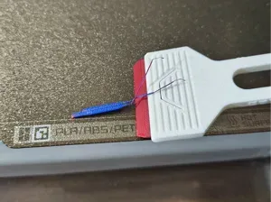 Bed Scraper with Replaceable Blade