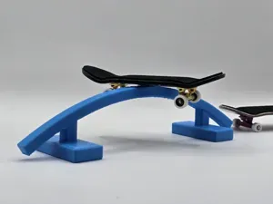 Low Curved Grind Rail Fingerboard Obstacle Trick