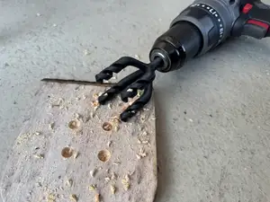 Quad drill bit