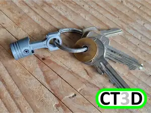 Magnetic moving Piston Keychain