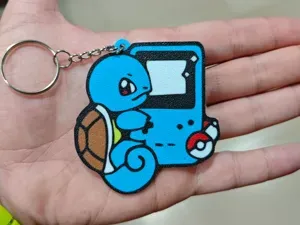 Squirtle & Game Boy – Llavero retro multicolor